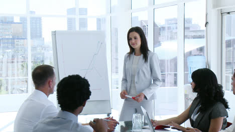 Business-team-speaking-in-a-presentation