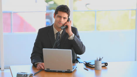 Businessman-taking-a-phone-call