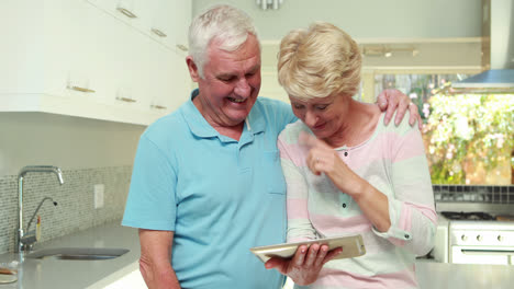 Senior-couple-using-tablet-pc