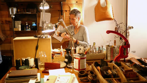 Attentive-craftswoman-working