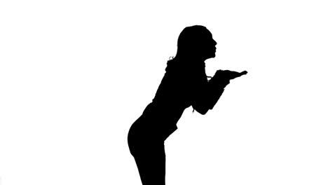 Christmas-girls-silhouette-walking-and-blowing-kiss
