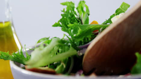 Close-up-of-mixing-salad