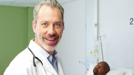 Portrait-of-smiling-male-doctor