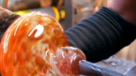 Glassblowers-shaping-a-molten-glass