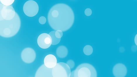 Animation-of-white-spots-on-blue-background