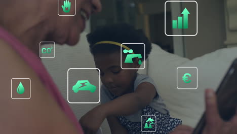 Animation-of-eco-icons-and-data-processing-over-african-american-woman-with-girl-using-smartphone