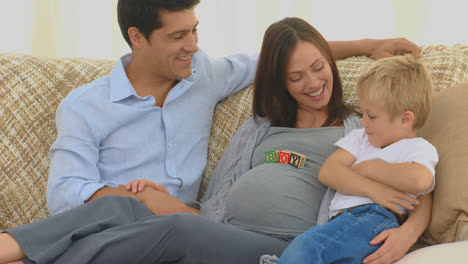 Pregnant-woman-with-her-husband-and-her-son