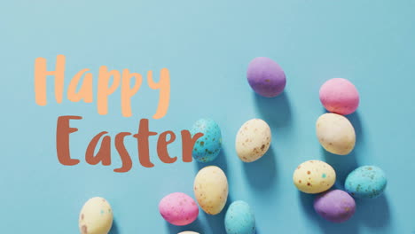 Animation-of-happy-easter-text-over-easter-eggs