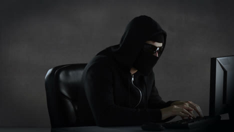 Composite-video-of-hacker-using-laptop