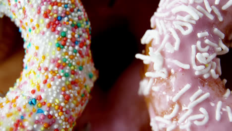 Close-up-of-tasty-doughnuts-with-sprinkles
