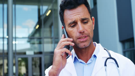 Doctor-talking-on-mobile-phone