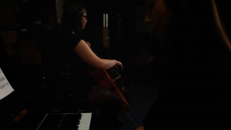 Two-women-playing-a-violin-and-piano
