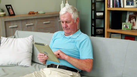 Senior-man-using-tablet-pc