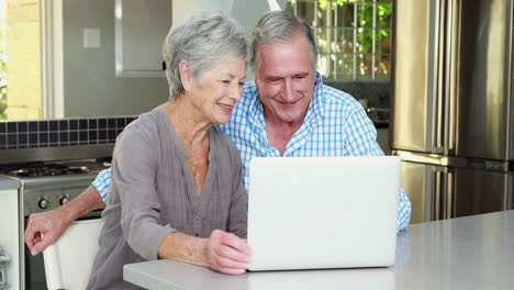 Senior-couple-doing-video-chat
