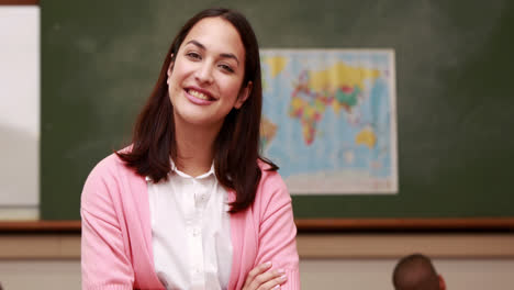 Smiling-woman-teacher-with-thumbs-up
