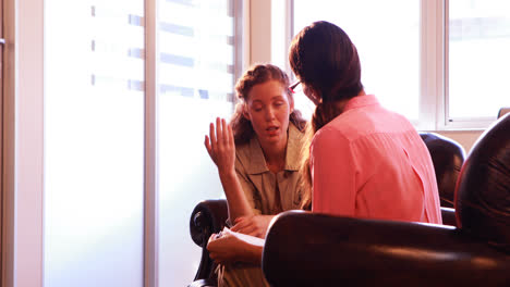 Female-patient-having-discussion-with-therapist