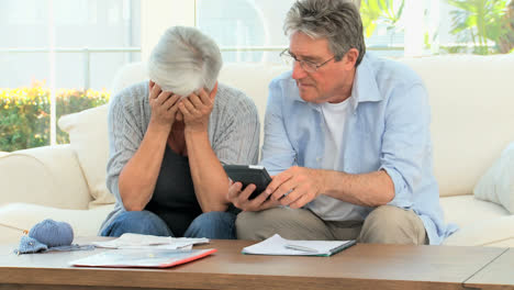 Mature-couple-calculating-their-domestic-bills