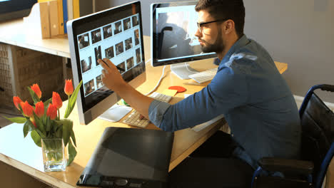 Male-graphic-designer-working-on-computer