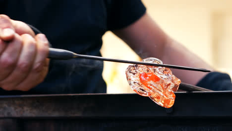 Glassblower-shaping-a-molten-glass