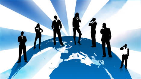 Business-people-silhouettes-standing-on-the-planet