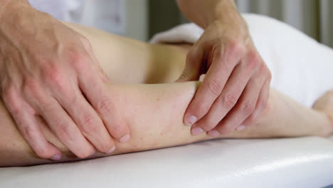Physiotherapist-giving-hand-massage-to-a-woman