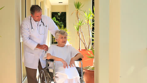 Doctor-with-wheelchair-patient