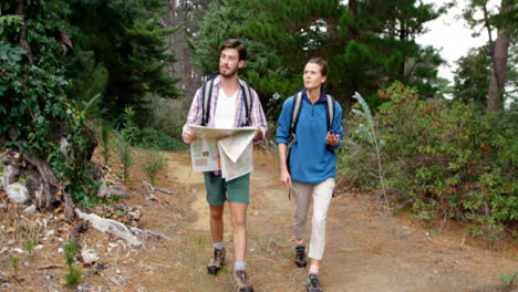 Couple-of-hiker-looking-a-map-and-compass