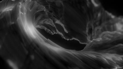 Animation-of-rotating-whirlpool-of-dark-liquid-mass-on-dark-background