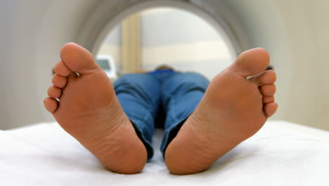 A-patient-is-loaded-into-an-mri-machine