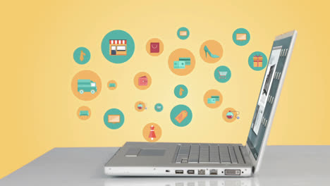 Shopping-icons-popping-up-by-laptop