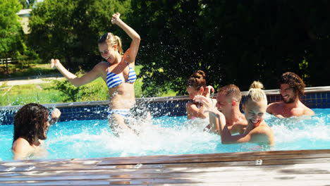 Group-of-friends-having-fun-in-swimming-pool