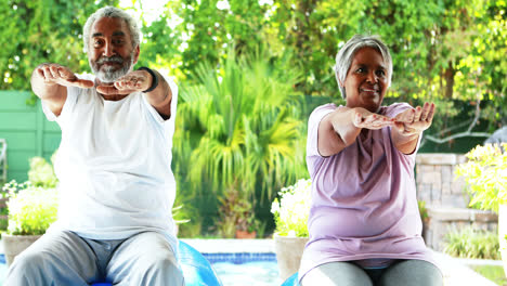 Senior-couple-exercising-at-home