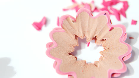 Pink-color-pencils-shavings-on-a-white-background