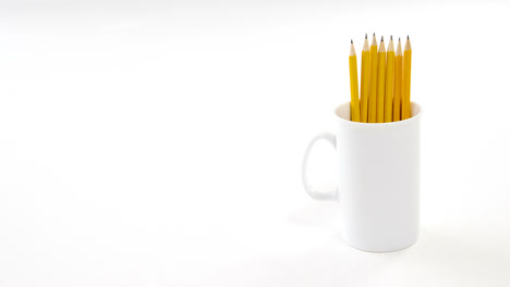 Yellow-color-pencils-kept-in-mug