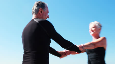 Senior-couple-dancing-on-beach