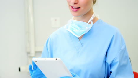 Female-nurse-using-digital-tablet