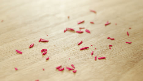 Colored-pencil-shavings-on-wooden-table