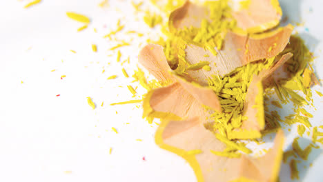 Yellow-color-pencils-shavings-on-a-white-background