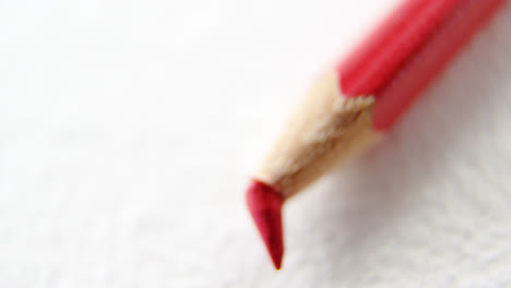 Red-colored-pencil-with-broken-tip