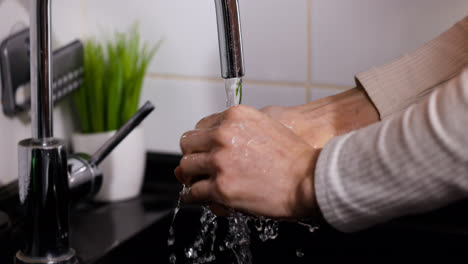 Person-washing-hands