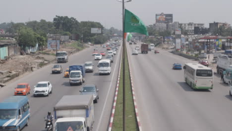 CAF-Flag-Waving-On-A-Pole-In-Middle-Of-Highway-During-AFCON-2023