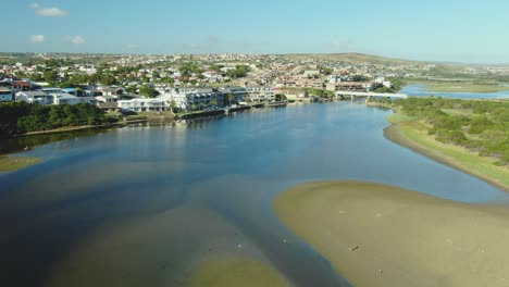 Drone-aerial-of-affluent-coastal-properties-next-to-a-river-in-South-Africa