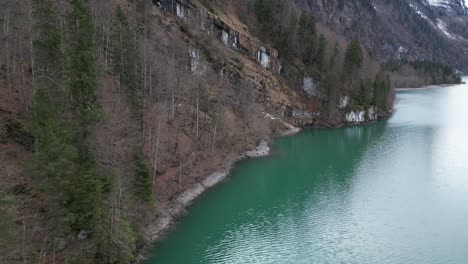 Klöntalersee-Switzerland-Glarus-mountain-edge-against-turquoise-Swiss-lake