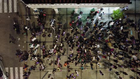 Aerial-looks-directly-down-onto-demonstrators-on-Women's-Day-March