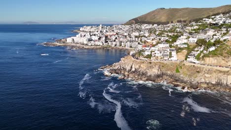 Aerial-of-a-coastal-road-and-coastline-of-Cape-Town,-South-Africa