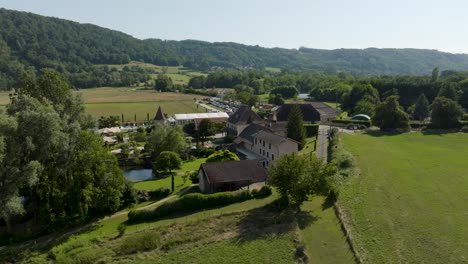 Aerial-view-of-elegant-wedding-resort-venue-in-French-countryside-landscape