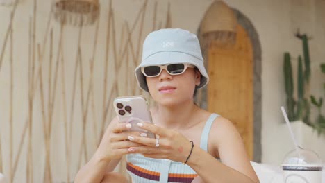 Close-up-an-Asian-girl-using-iPhone