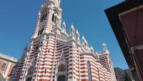 Gothic-Splendor-of-Bogotá's-El-Carmen-Church-Striped-Facade,-Colombia