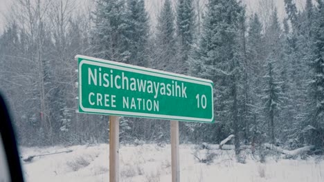 Provincial-Green-White-Highway-Marker-Sign-for-Nisichawayasihk-Cree-Nation-NCN-Indian-Aboriginal-Indigenous-First-Nations-Reserve-Land-in-Northern-Manitoba-Thompson-Canada