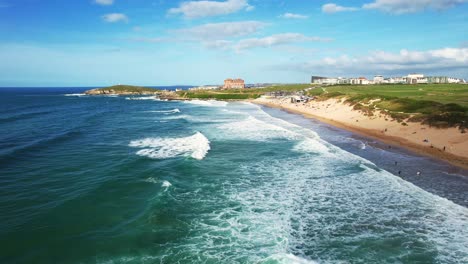 Fistral-Beach-Views-with-Surfing-Waves-on-a-Summers-Day-in-Cornwall